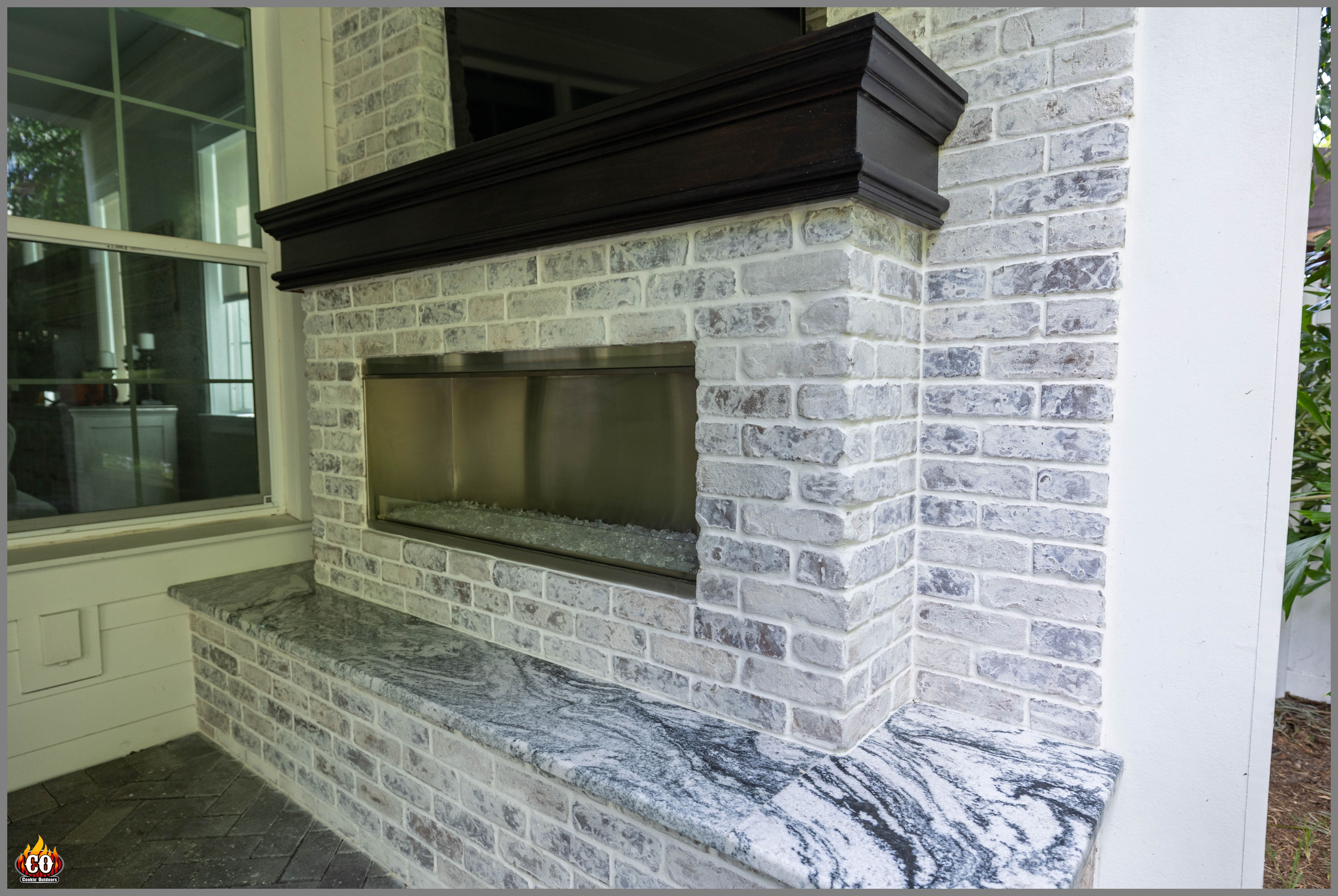 Concrete linear gas fireplace in South Tampa, FL